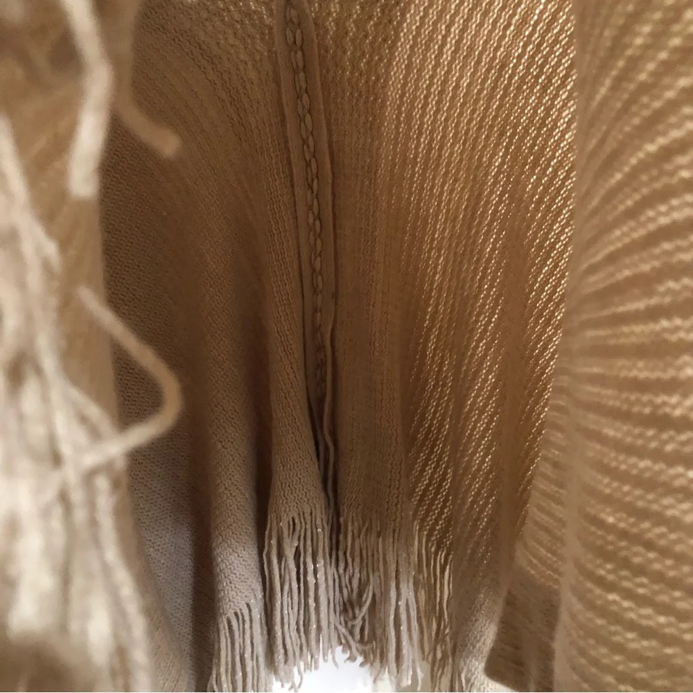 Tan knitted metallic gold fringe hem poncho